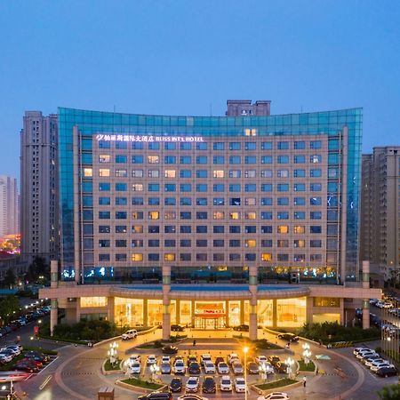 Bliss International Hotel Вэйхай Экстерьер фото
