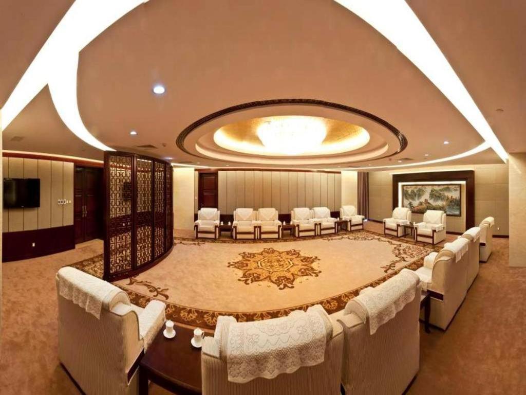 Bliss International Hotel Вэйхай Экстерьер фото