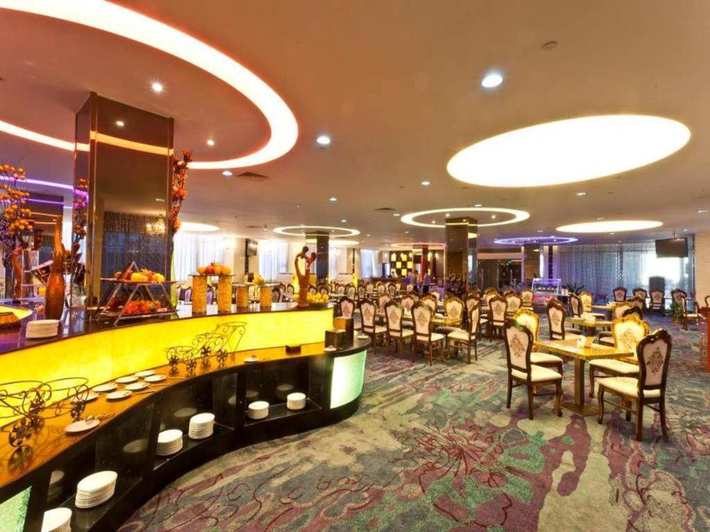 Bliss International Hotel Вэйхай Экстерьер фото