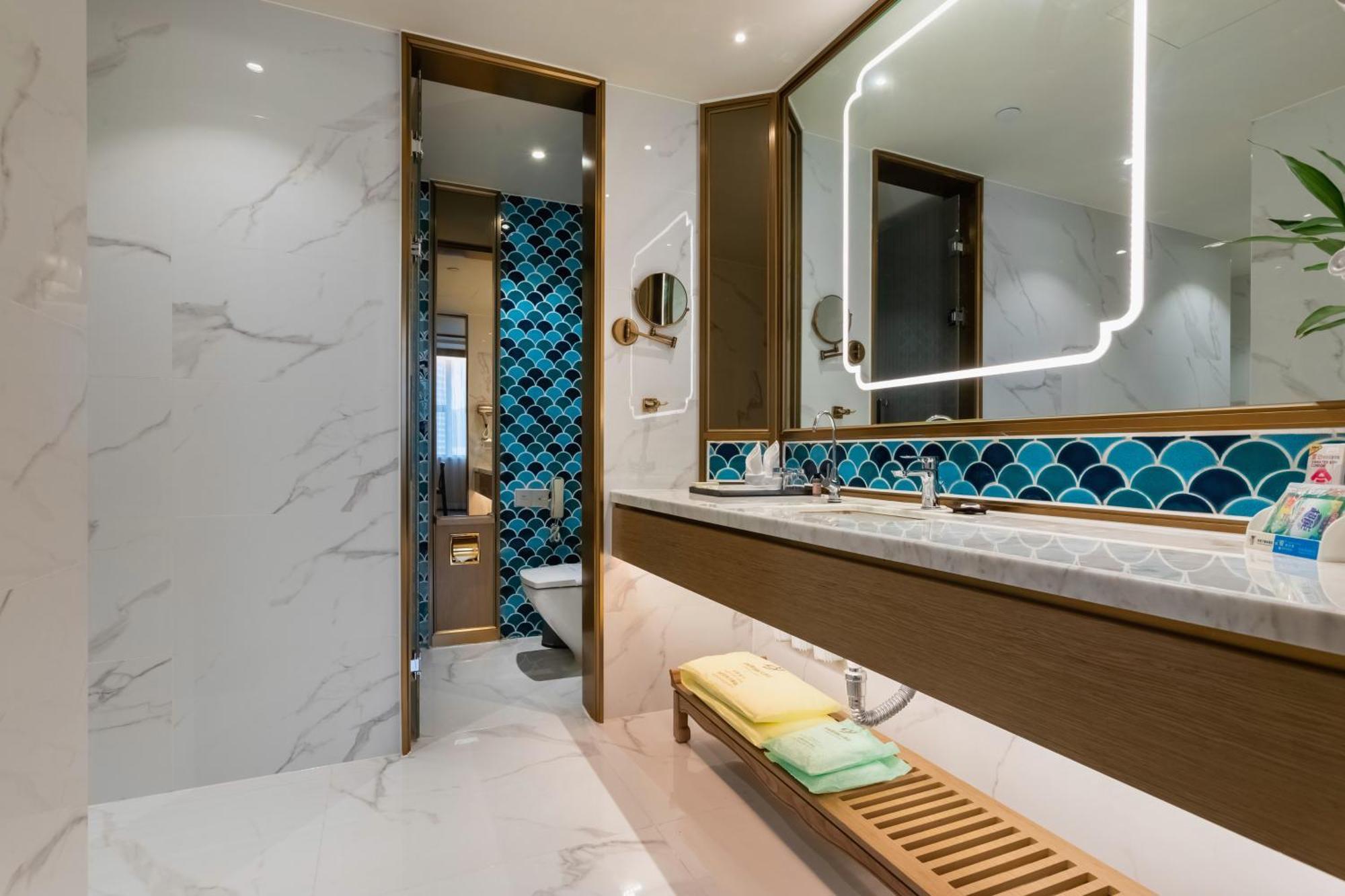 Bliss International Hotel Вэйхай Экстерьер фото