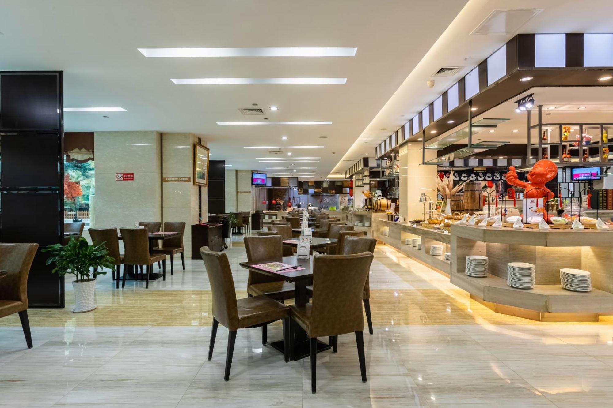 Bliss International Hotel Вэйхай Экстерьер фото