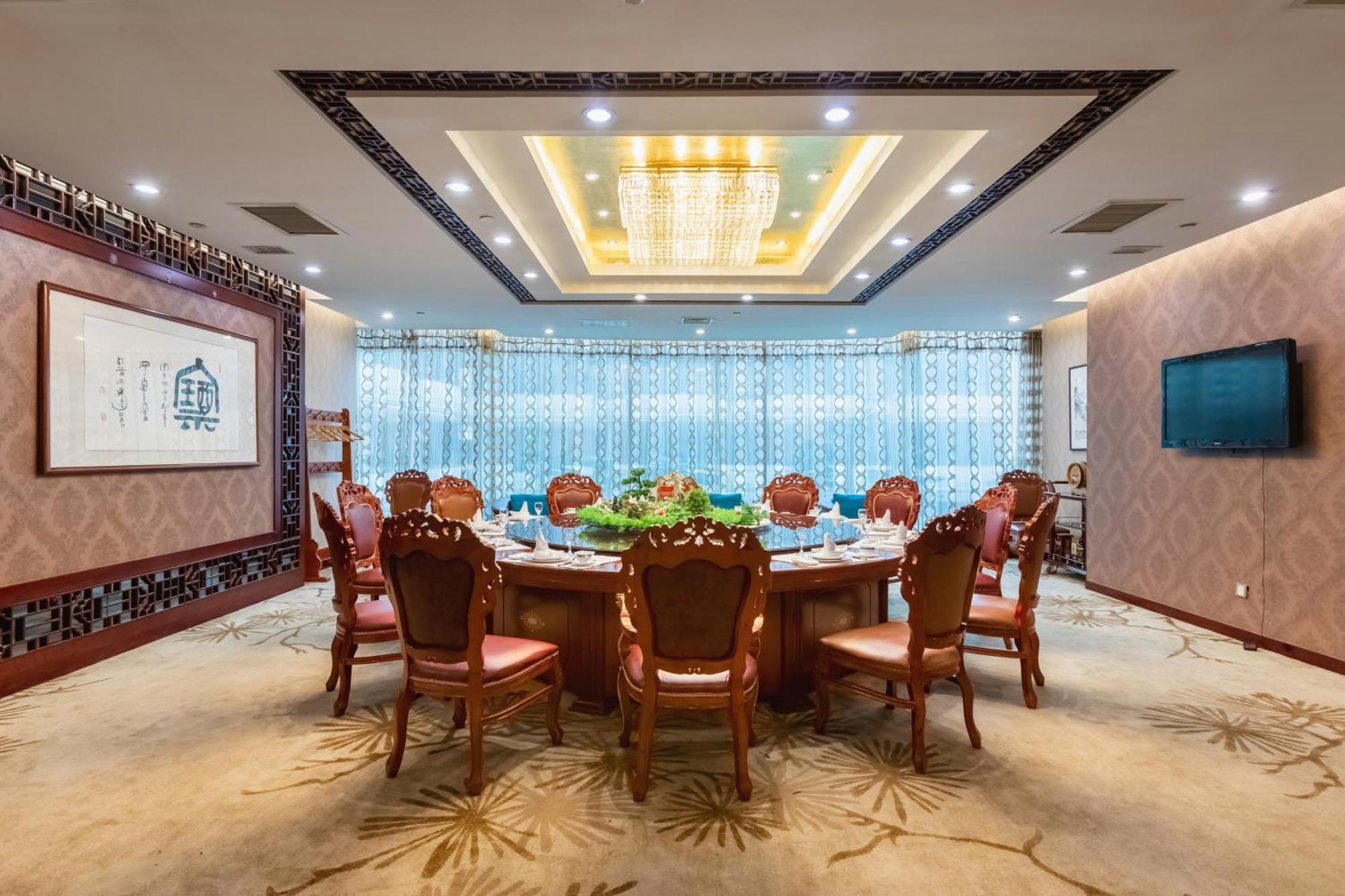 Bliss International Hotel Вэйхай Экстерьер фото
