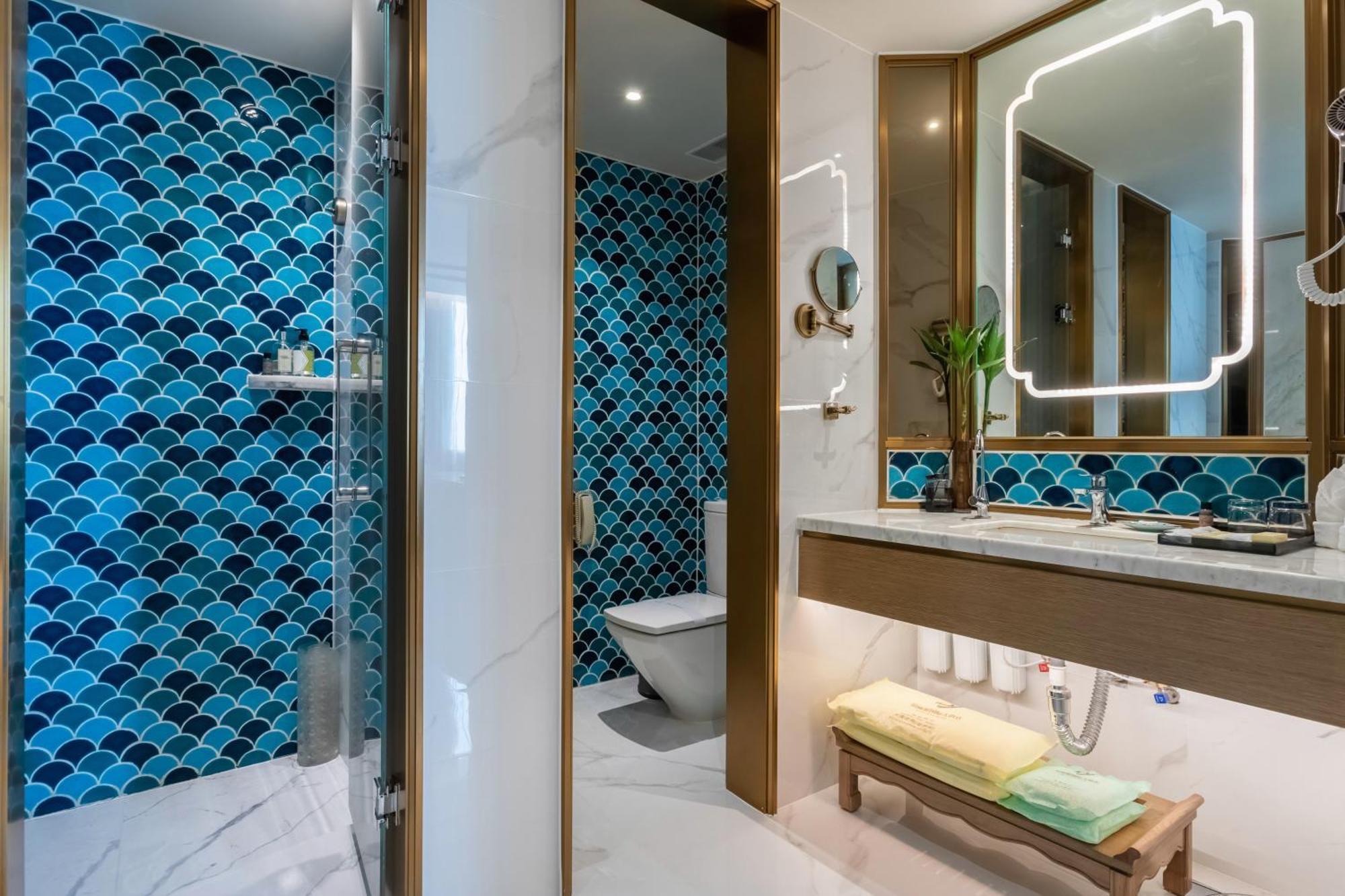Bliss International Hotel Вэйхай Экстерьер фото
