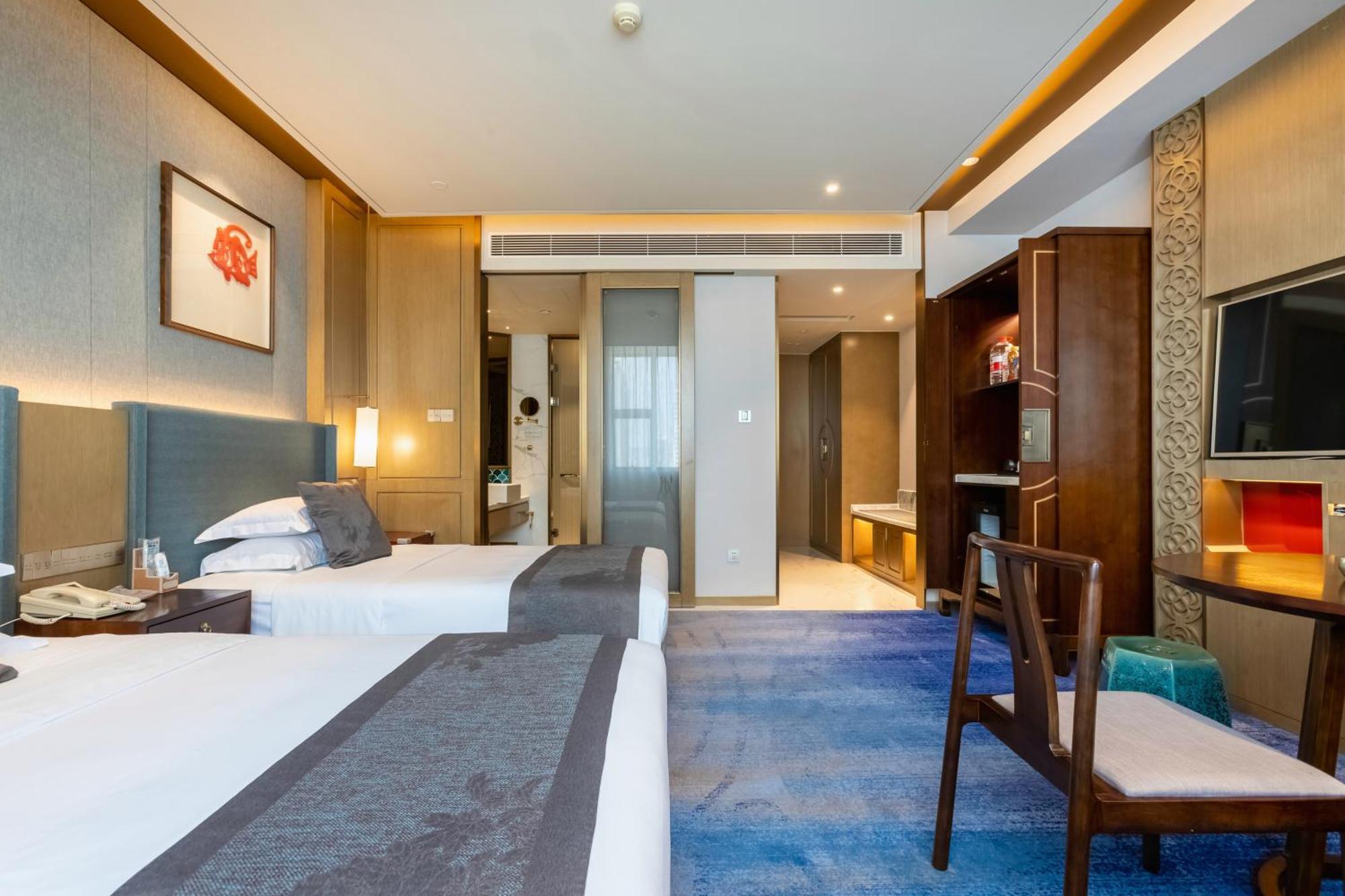 Bliss International Hotel Вэйхай Экстерьер фото