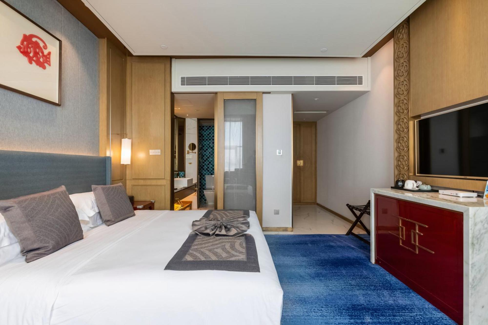 Bliss International Hotel Вэйхай Экстерьер фото