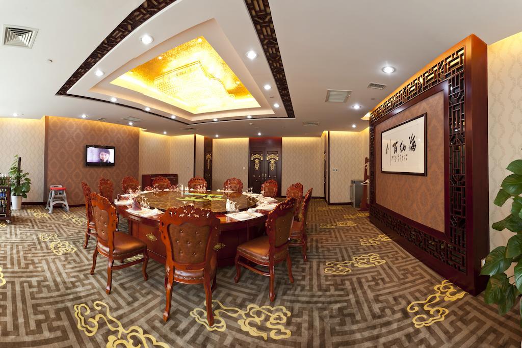 Bliss International Hotel Вэйхай Экстерьер фото