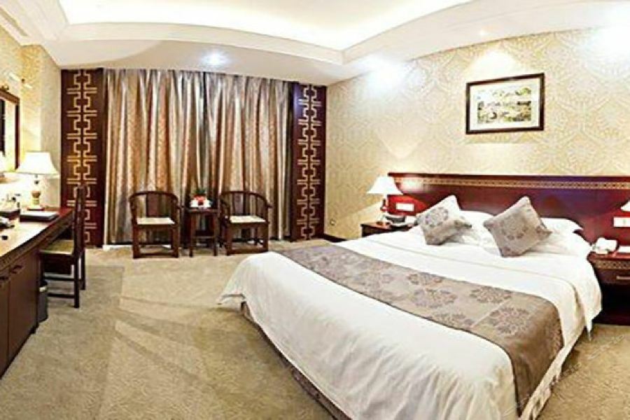 Bliss International Hotel Вэйхай Экстерьер фото